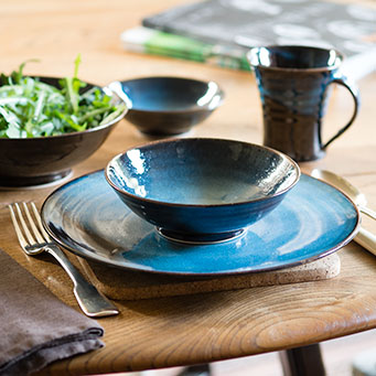 LUNA table setting – dinner plate (26cm) and soup bowl (15cm), with pasta bowl (19cm) dessert bowl (11.5cm) and mug (9cm) in background